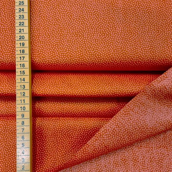 Bomullstyg Dotty tegel/laxrosa fg 714